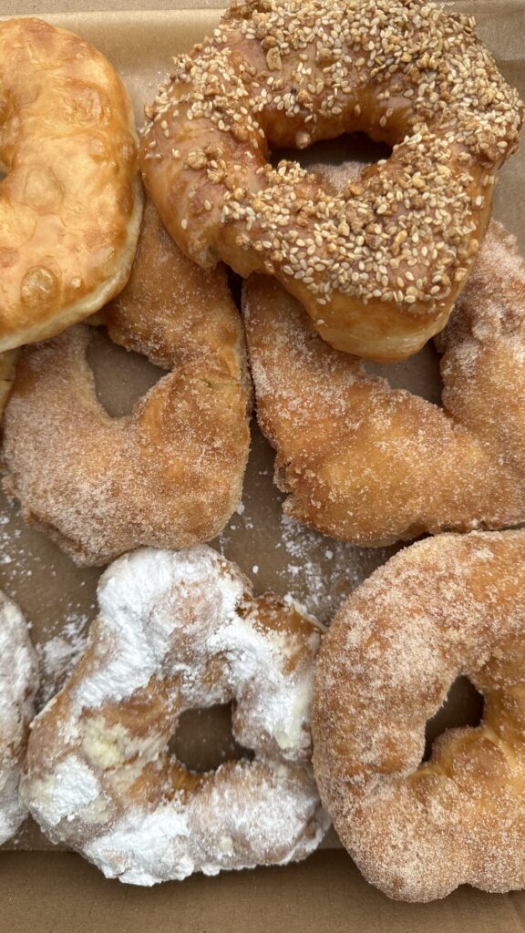 close up photo of various donuts
