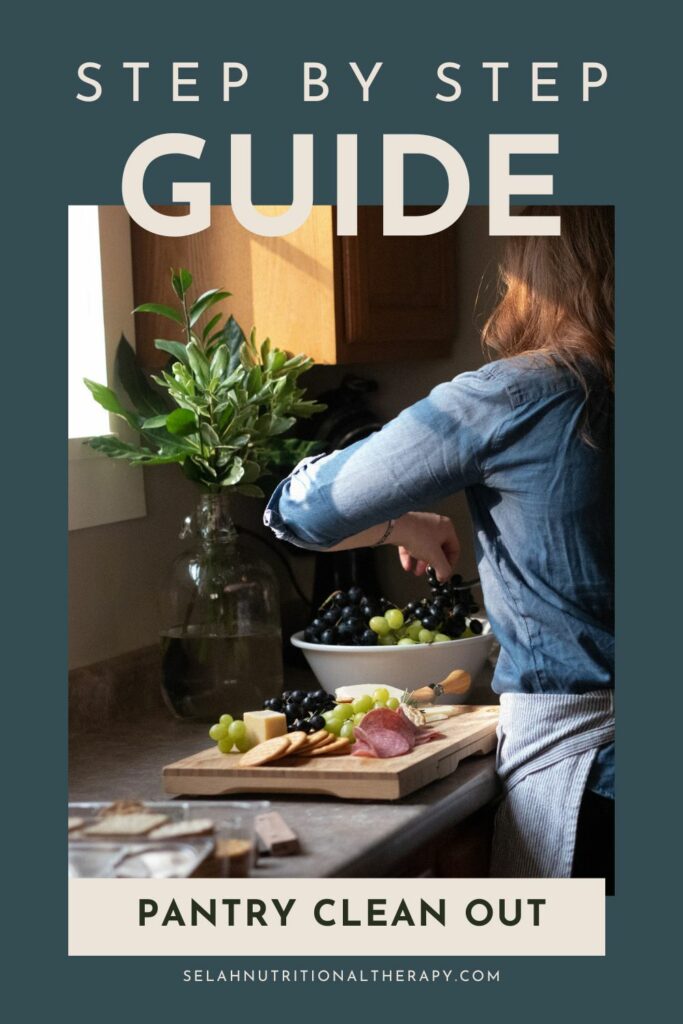 woman in kitchen with charcouterie board 