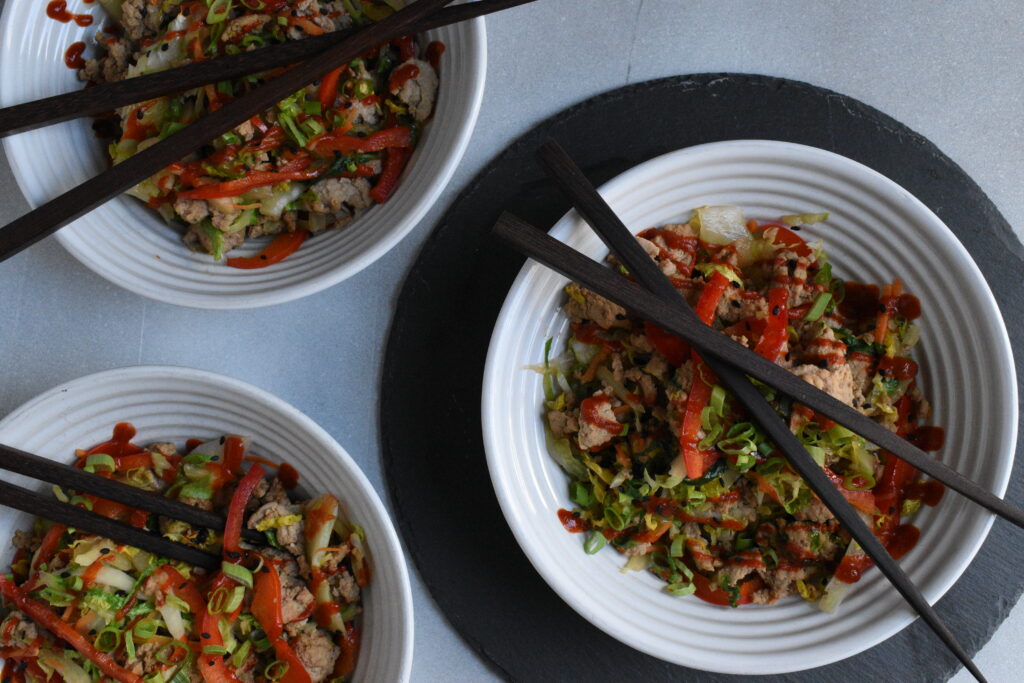 overhead show of egg roll in a bowl in 3 bowls